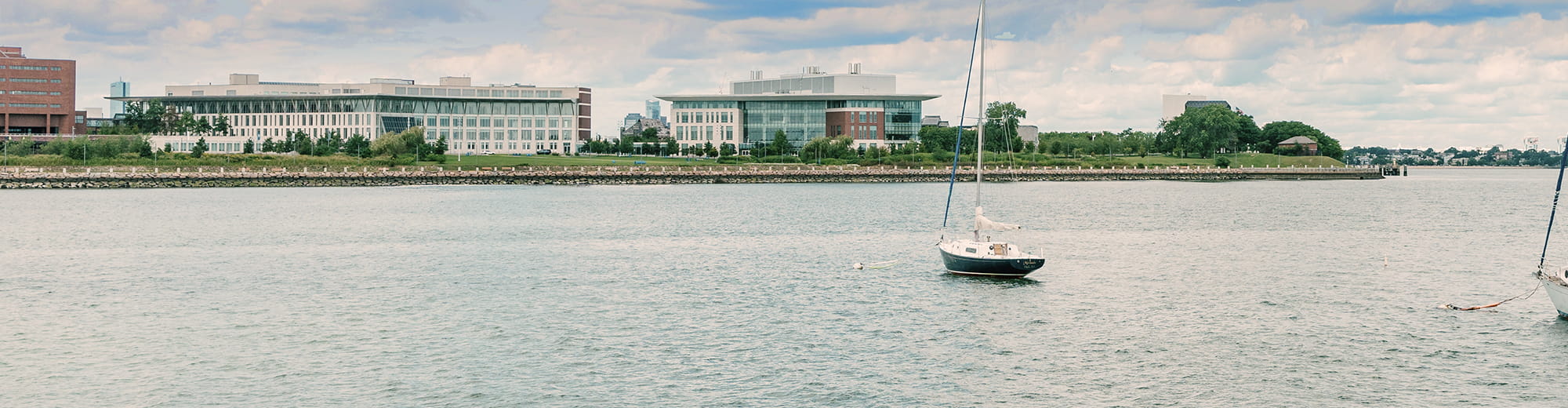 View of University Hall and Campus Center from the water.